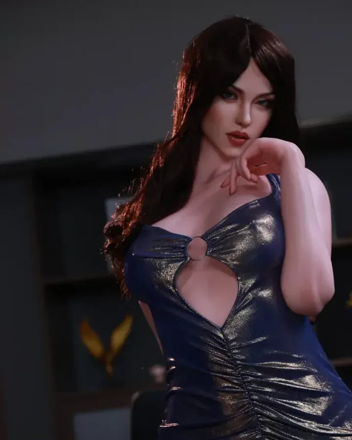 Brunette doll with long hair in a metallic navy dress with a ring cutout